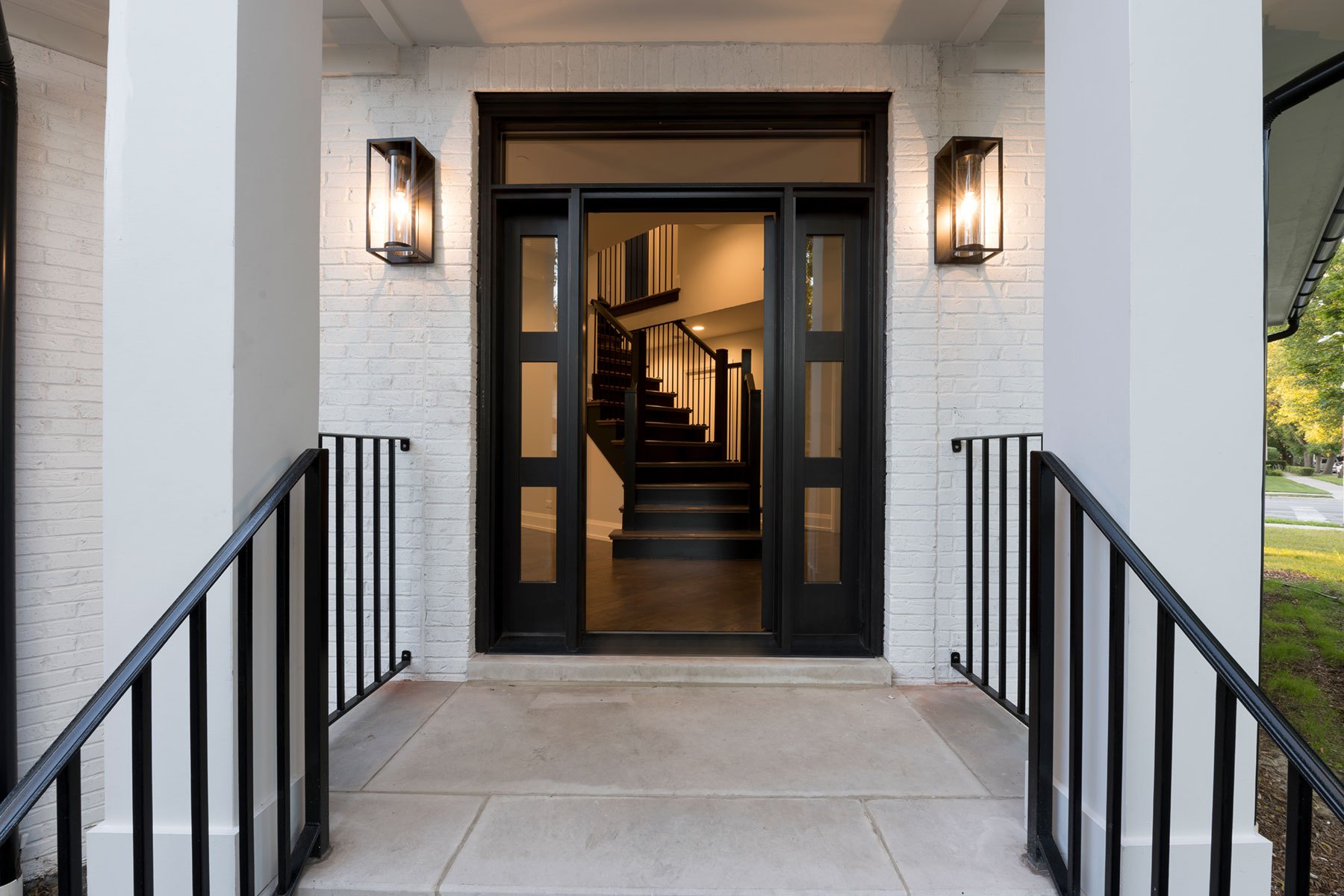Front Door Open - N. Francisco Ave., Chicago, IL Custom Home. America's Custom Home Builders: New Construction, Remodeling, Restoration Services. Residential and Commercial.