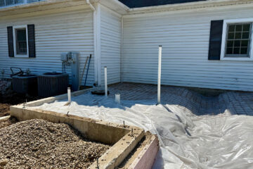 Prepping to pour the slab for the addition on Middlefork in Northfield - Home Builders News 7191