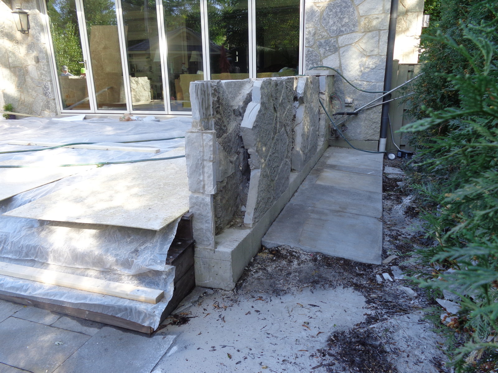 patio-wall-masonry-demolition-outdoor-structure-construction