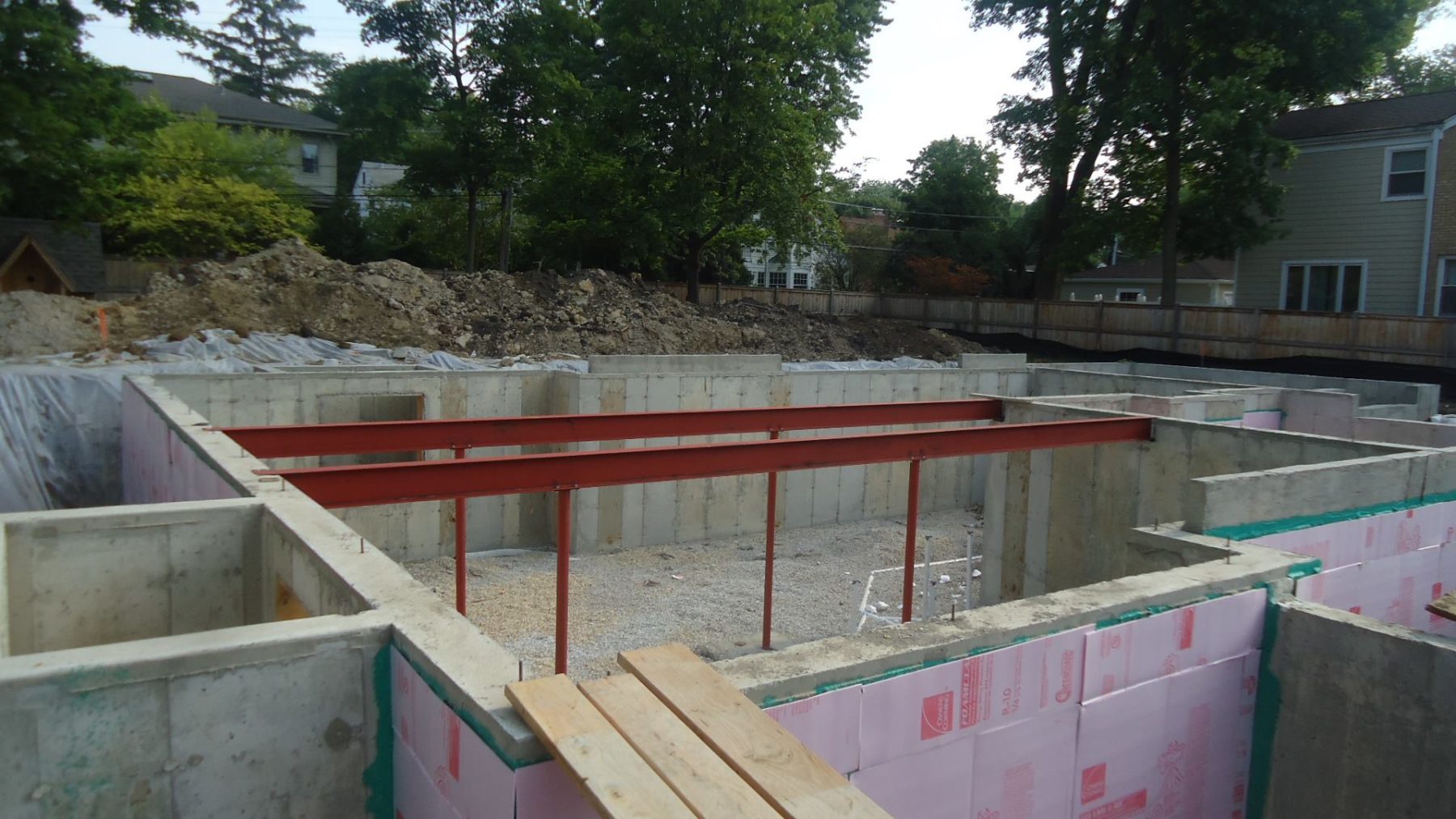 The Rub-R-Wall product has been applied to the Custom Home foundation